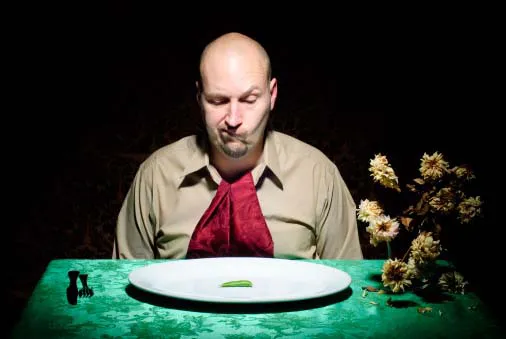 confused man looking at his plate